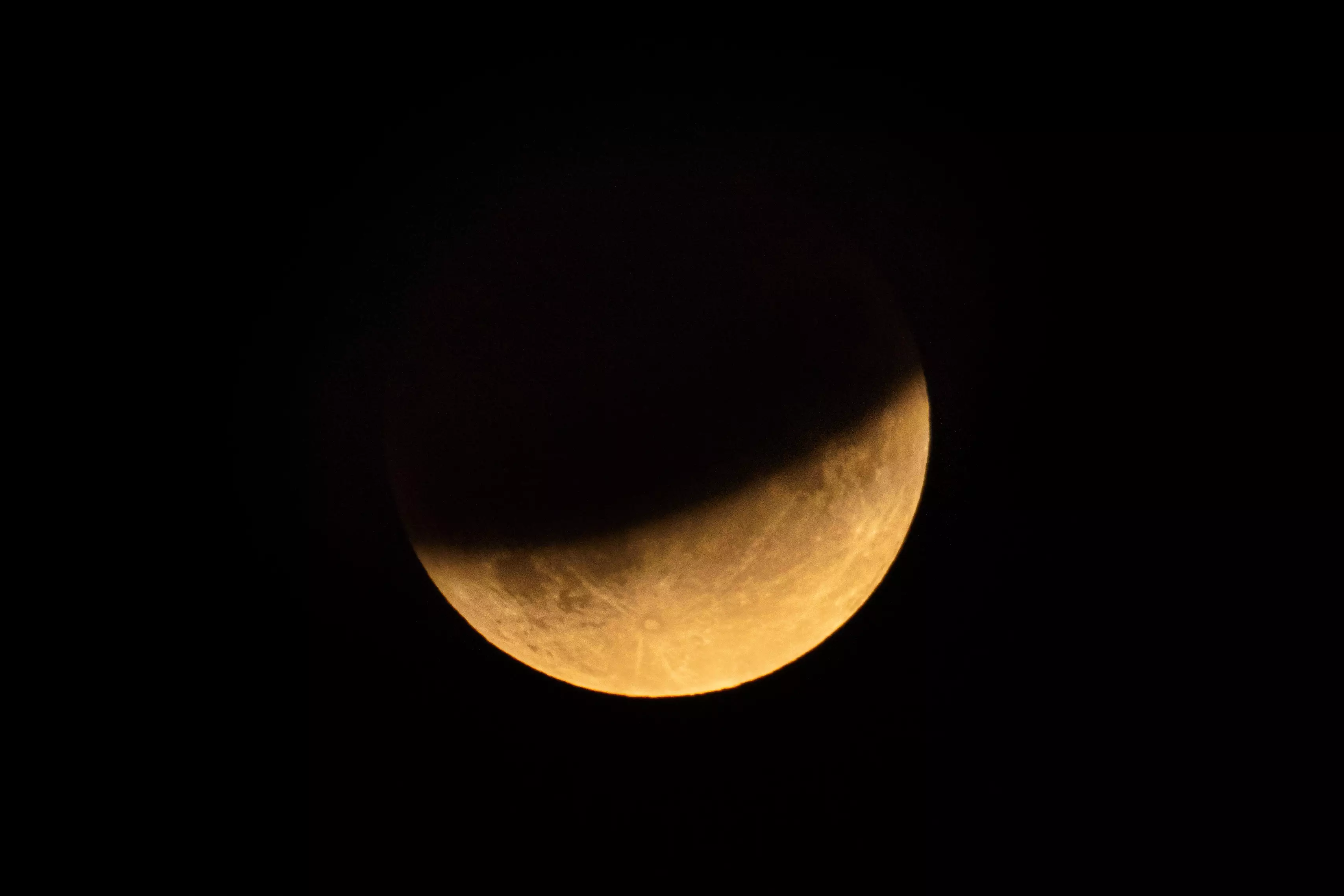 The half-blood moon spotted during a partial eclipse over London in 2019 (