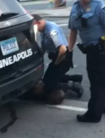 A still from a video showing George Floyd on the ground before he lost consciousness.