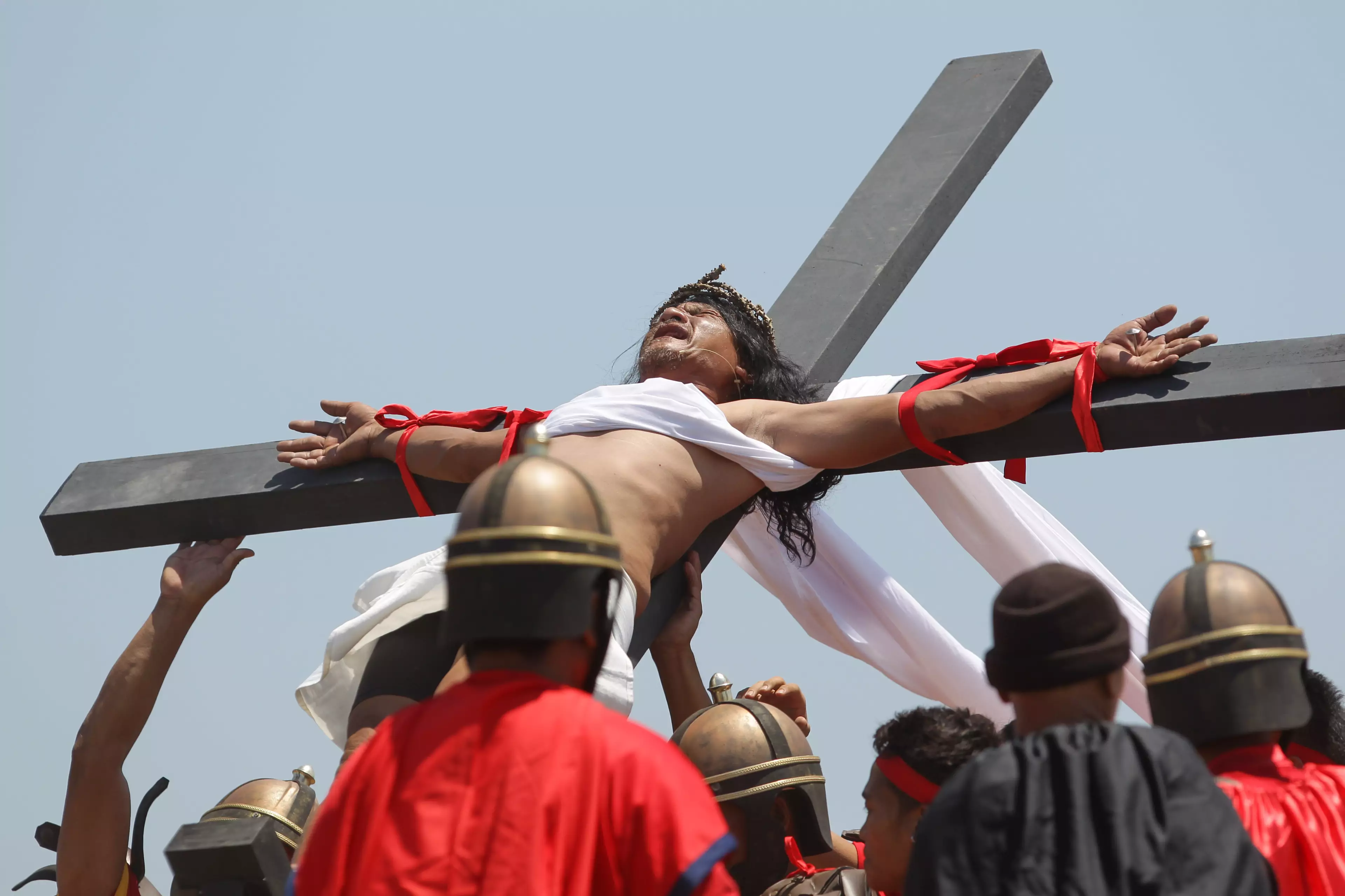 Ruben Enaje is crucified during the celebration in 2015.