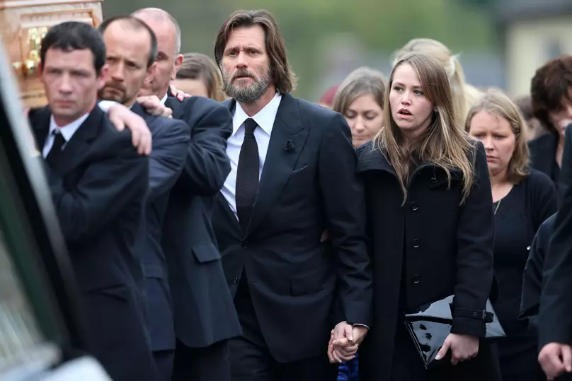 Jim Carrey joining mourners behind the coffin of ex-girlfriend Cathriona White.