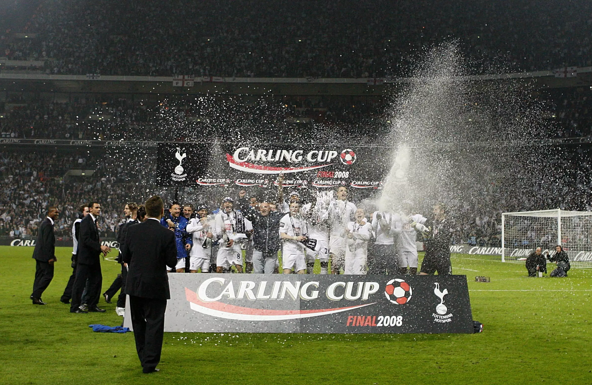 Spurs lift their last piece of silverware. Image: PA Images