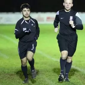 Ali Perros (left) took up refereeing to support himself at university