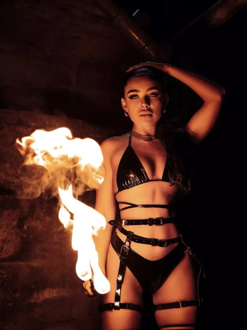 Alexis Bailey is a professional fire-eater and aerial dancer (