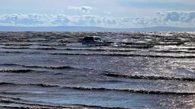 Couple's Car Sinks In Sea After Driver Wanted To 'Get Closer' To Water