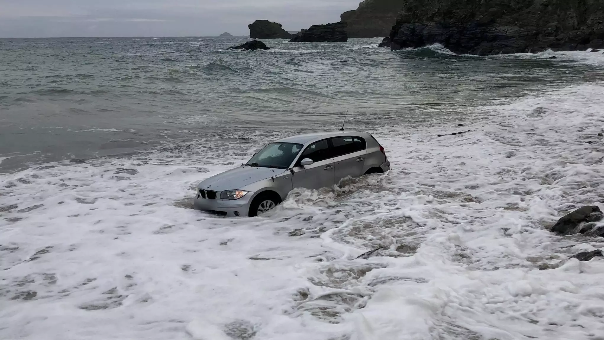 BMW Swept Into Sea After Being Left Parked On Beach
