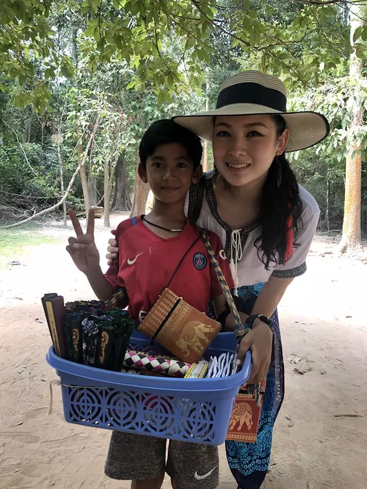 Venus GWC with the Cambodian boy who was trying to sell souvenirs using different languages.
