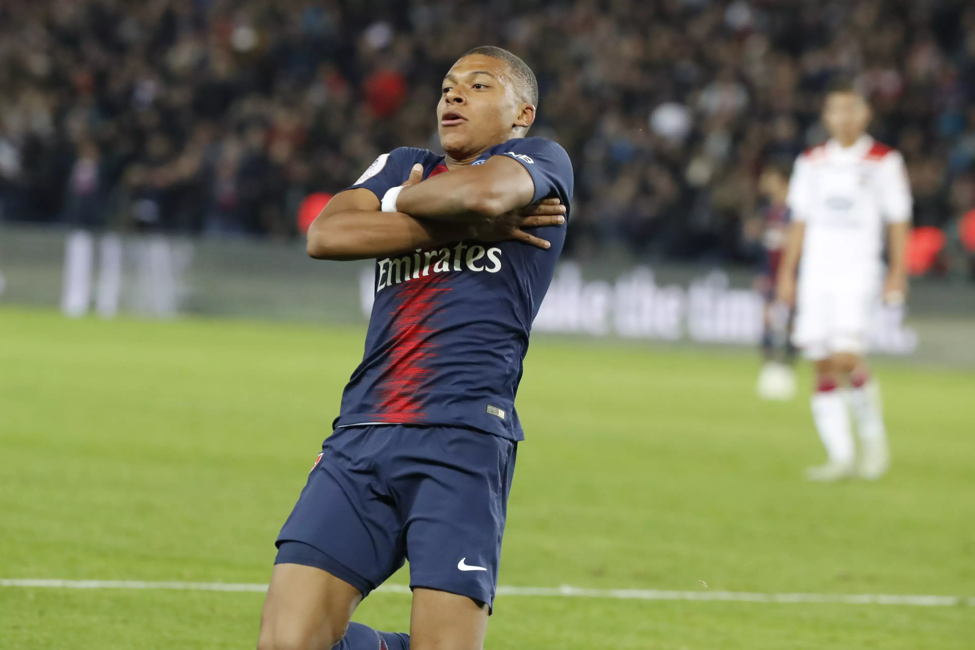 PSG forward Kylian Mbappe often celebrates his goals with his arms folded