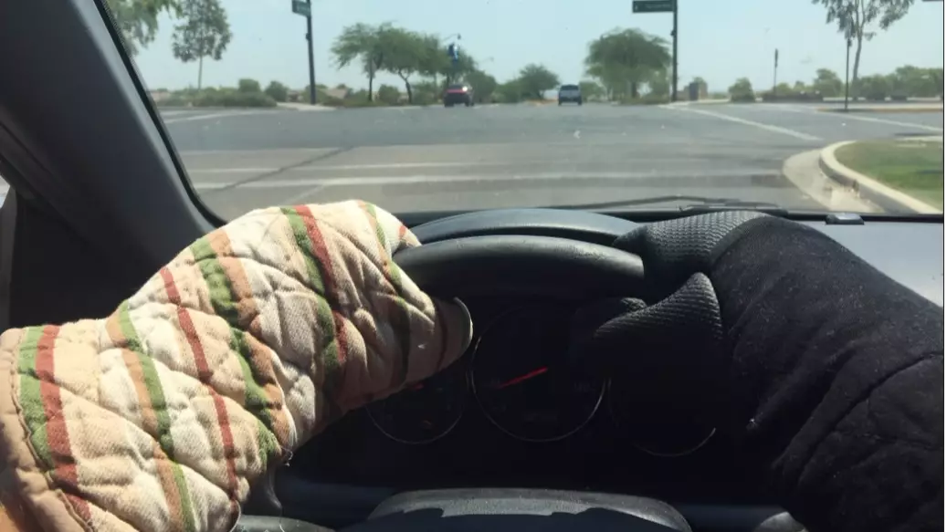 The Arizona Heat Is Melting Street Signs And Forcing Some People To Wear Oven Gloves To Drive