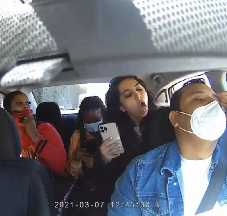 Kimiai could be seen coughing on the 32-year-old Uber driver.