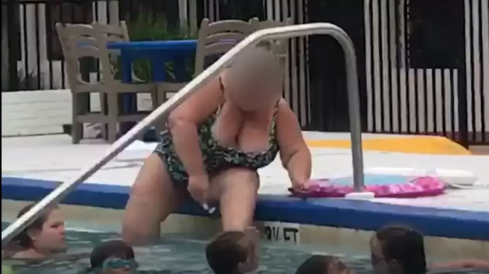 Woman Shaves Her Legs At Public Swimming Pool 