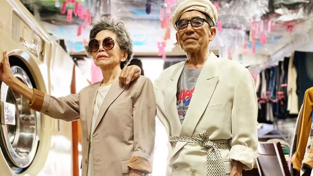 Elderly Couple With Laundry Business Go Viral After Dressing Up In Clothes Left By Customers