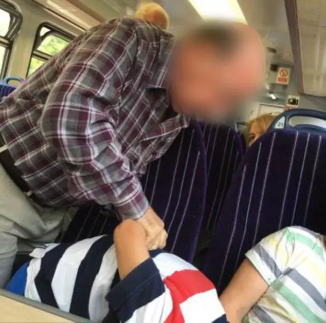 Cheeky Kid Won't Take His Feet Off Train Seats, Pensioner Executes Arm Lock On Him