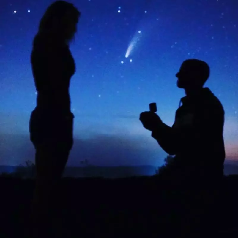 John popped the question beneath a rare comet.