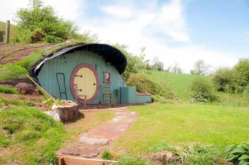 The Hobbit House is built into the side of a hill (