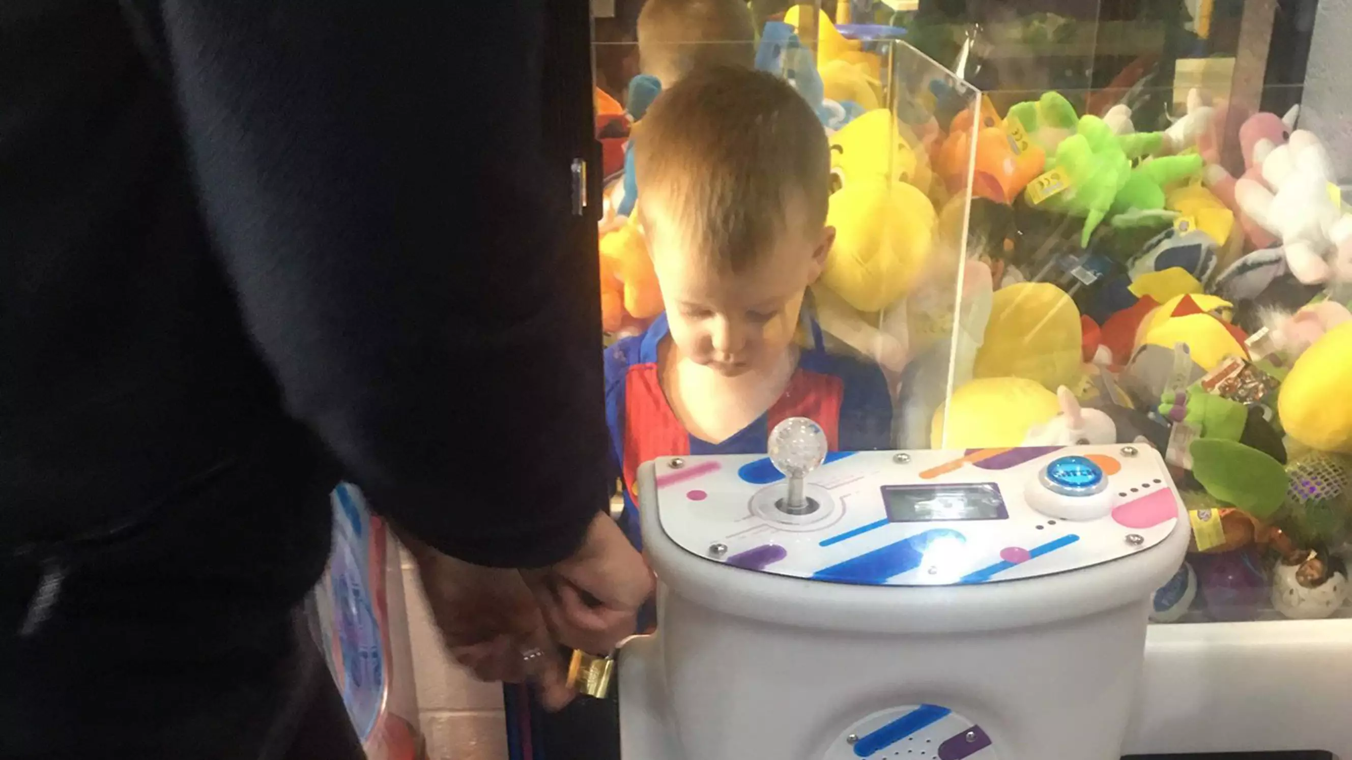 Little Boy Gets Stuck In Arcade Grabber After Climbing In For Teddy