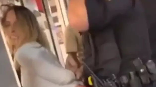 Woman Filmed Grinding On Police Officer As He Tries To Arrest Her