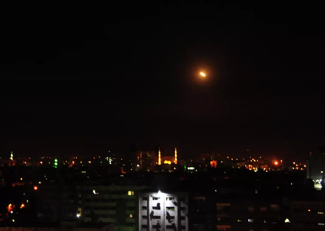 Surface-to-air missiles are seen over Syria's capital Damascus on 14 April.