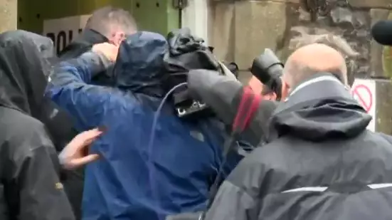 Fight Breaks Out Between Photographer And Cameraman At Polling Booth 