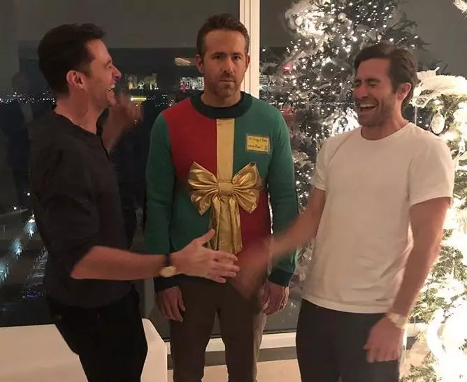 Hugh Jackman and Jake Gyllenhaal are clearly happy with their festive prank on Ryan Reynolds.