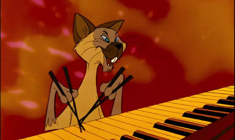 The cat from The Aristocats that shows exaggerated East Asian features and sings mockingly /