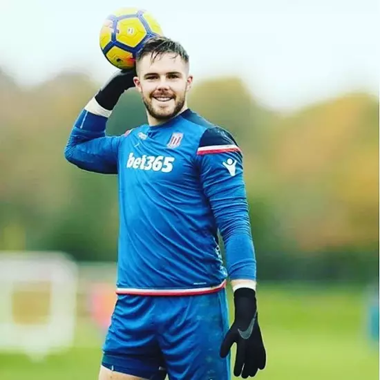 Jack Butland wearing a pair of black Vapor Touch.