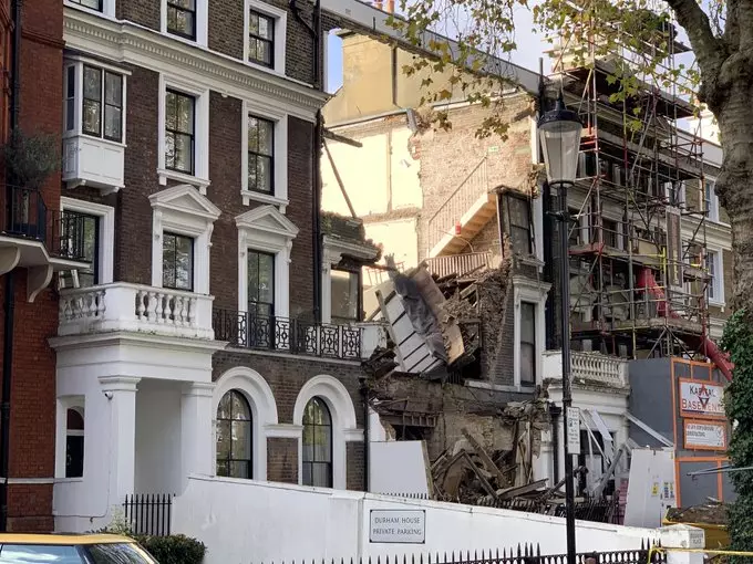 The building collapsed with a 'huge thud'.
