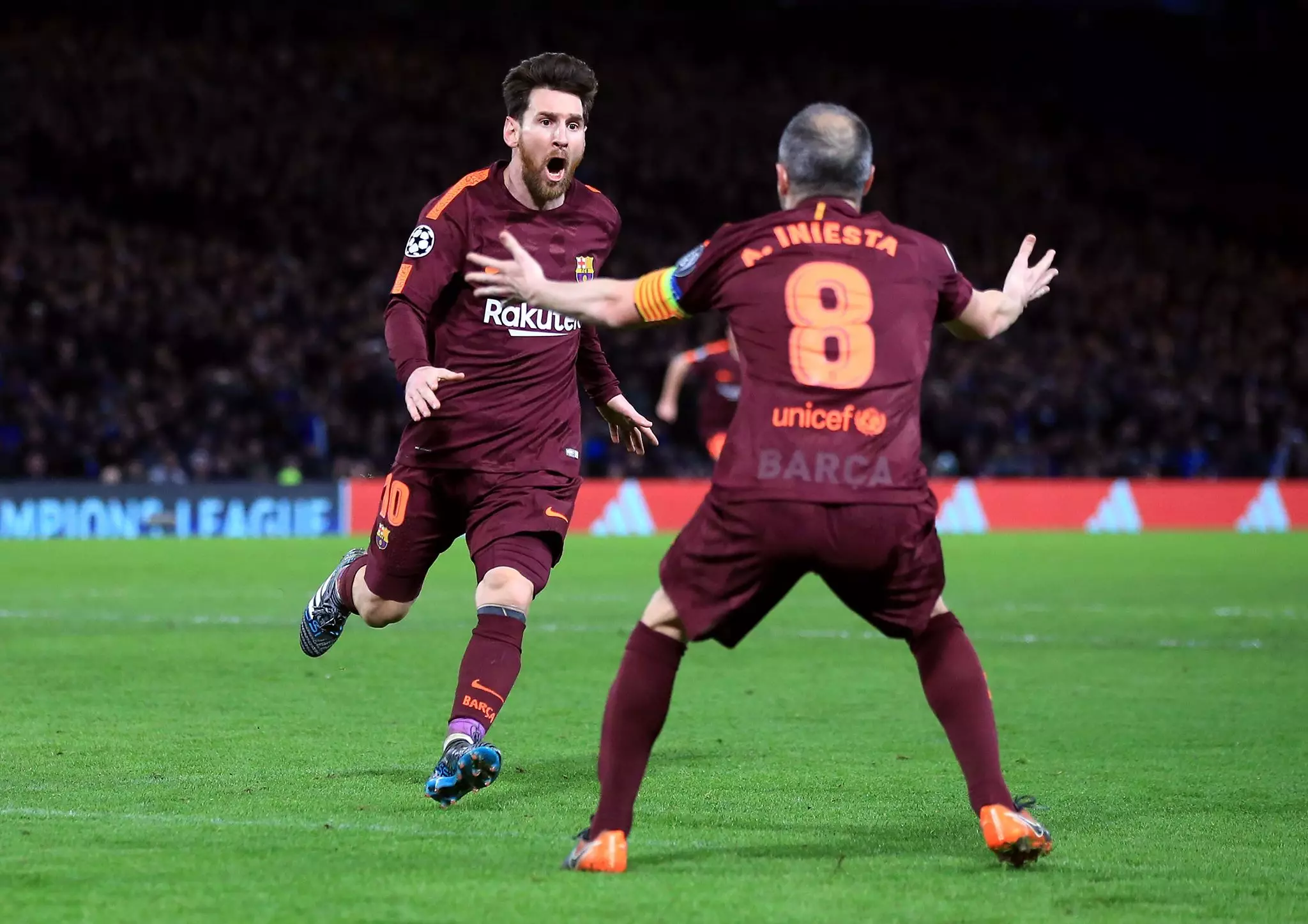 Messi and Iniesta celebrate. Image: PA