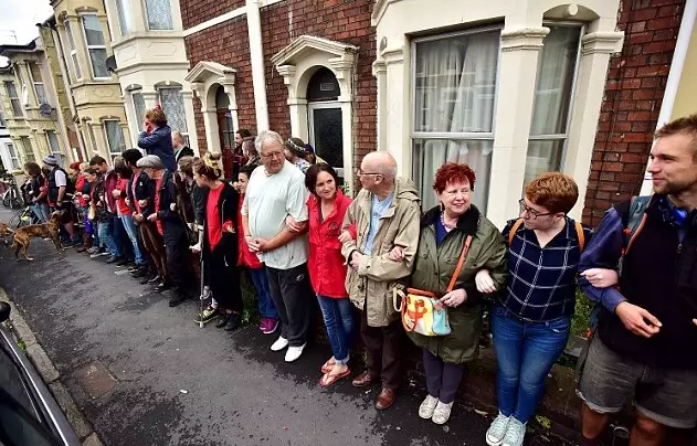 Heroic Community Forms Human Chain To Save Their Neighbour