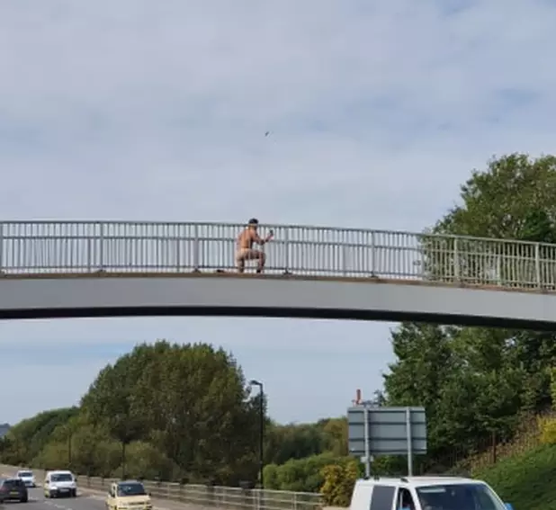 This 'completely nude' man was spotted on a bridge in Burton-upon-Trent.