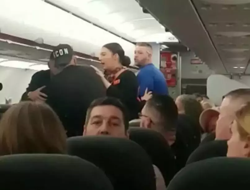 Security removed the group from the plane.