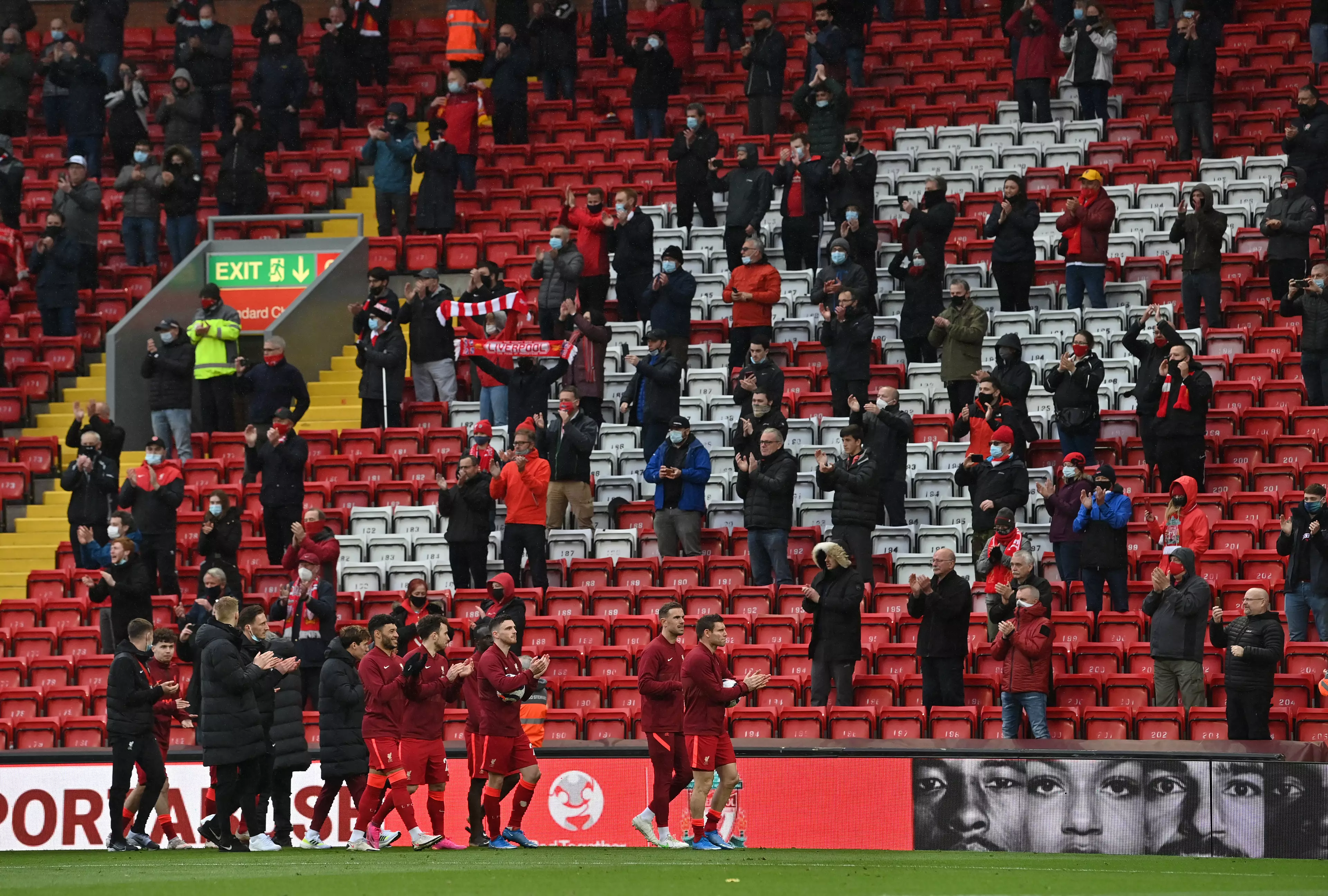 Liverpool players applaud their fans after playing Crystal Palace on the final day of the season. Image: PA Images