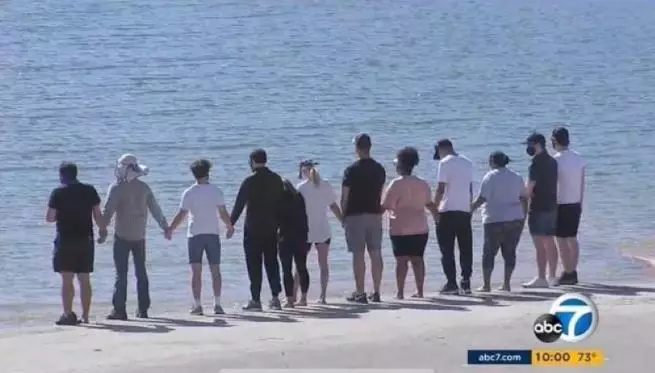 Ms Rivera's former Glee co-stars gather by Lake Piru and held hands.