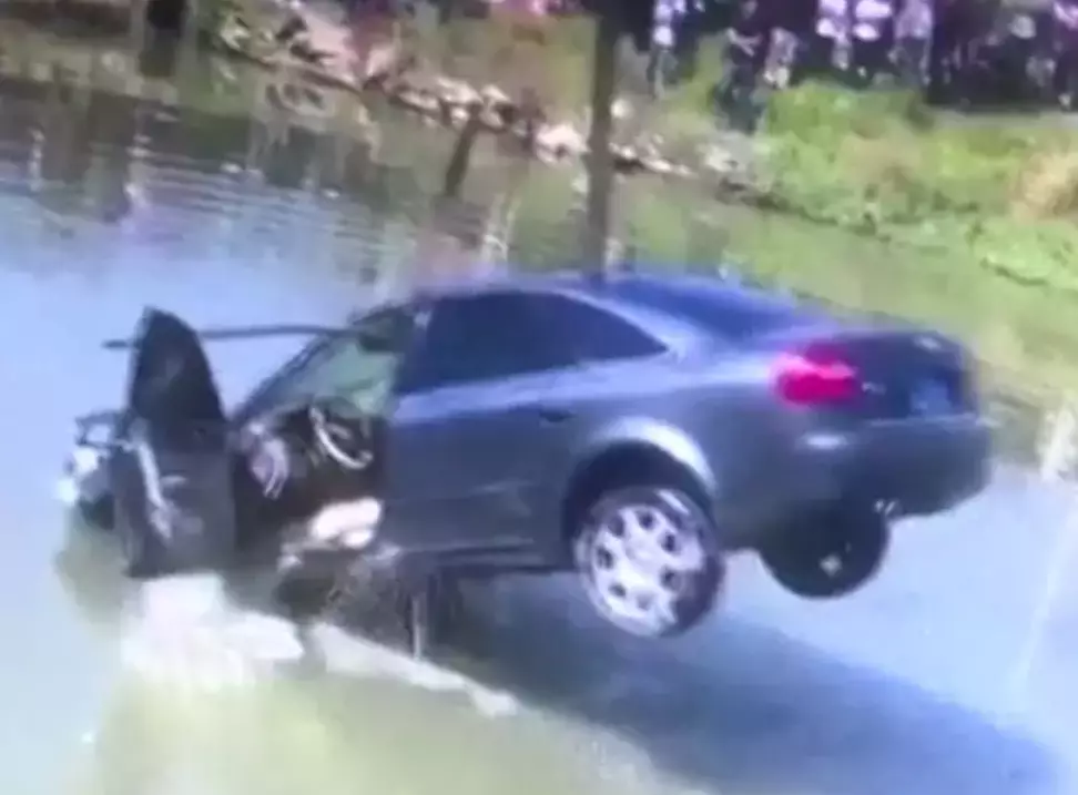 A couple in China crashed into a river mid-argument.