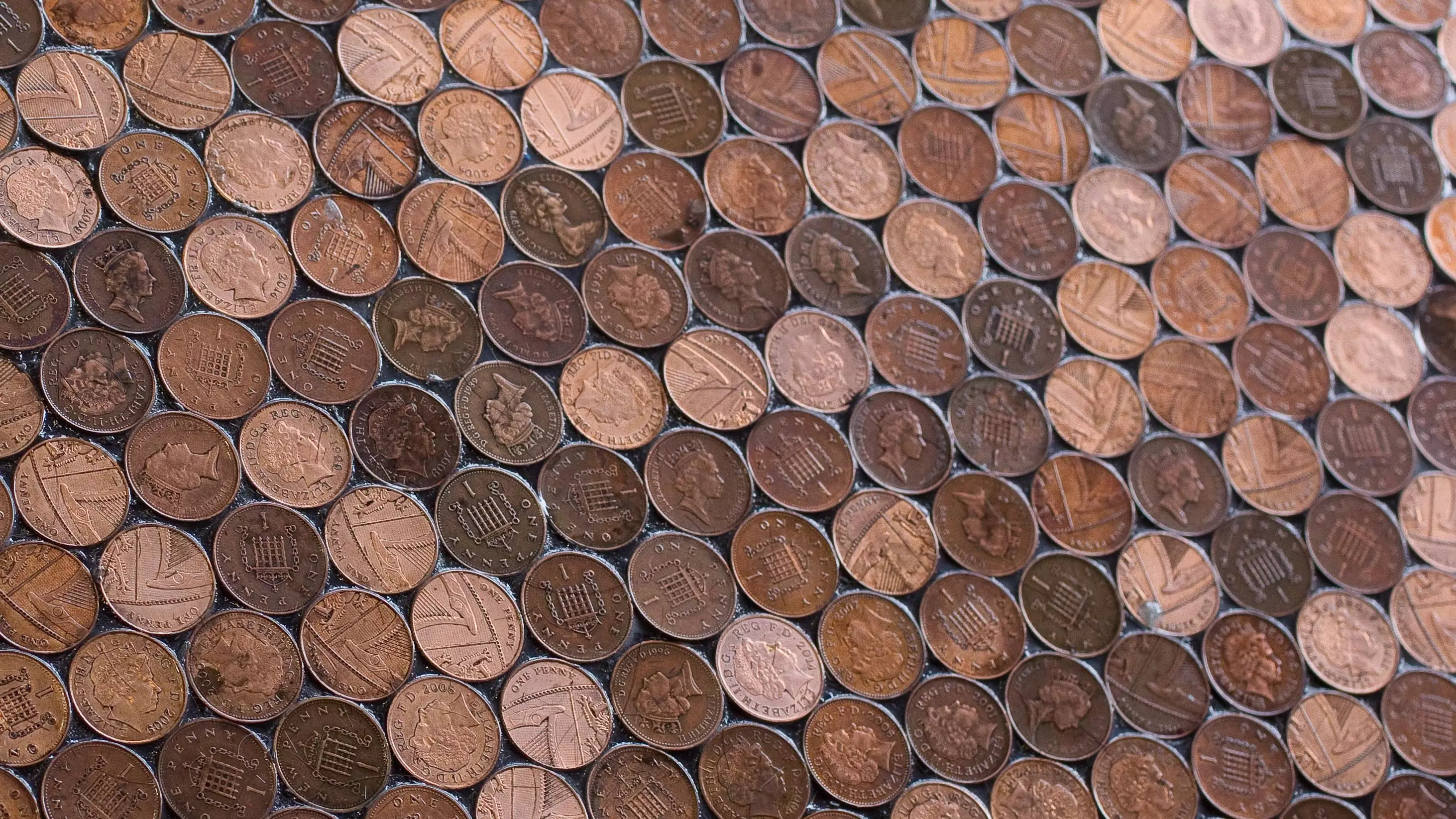 Barber Does His Own Flooring Using 70,000 1p Coins