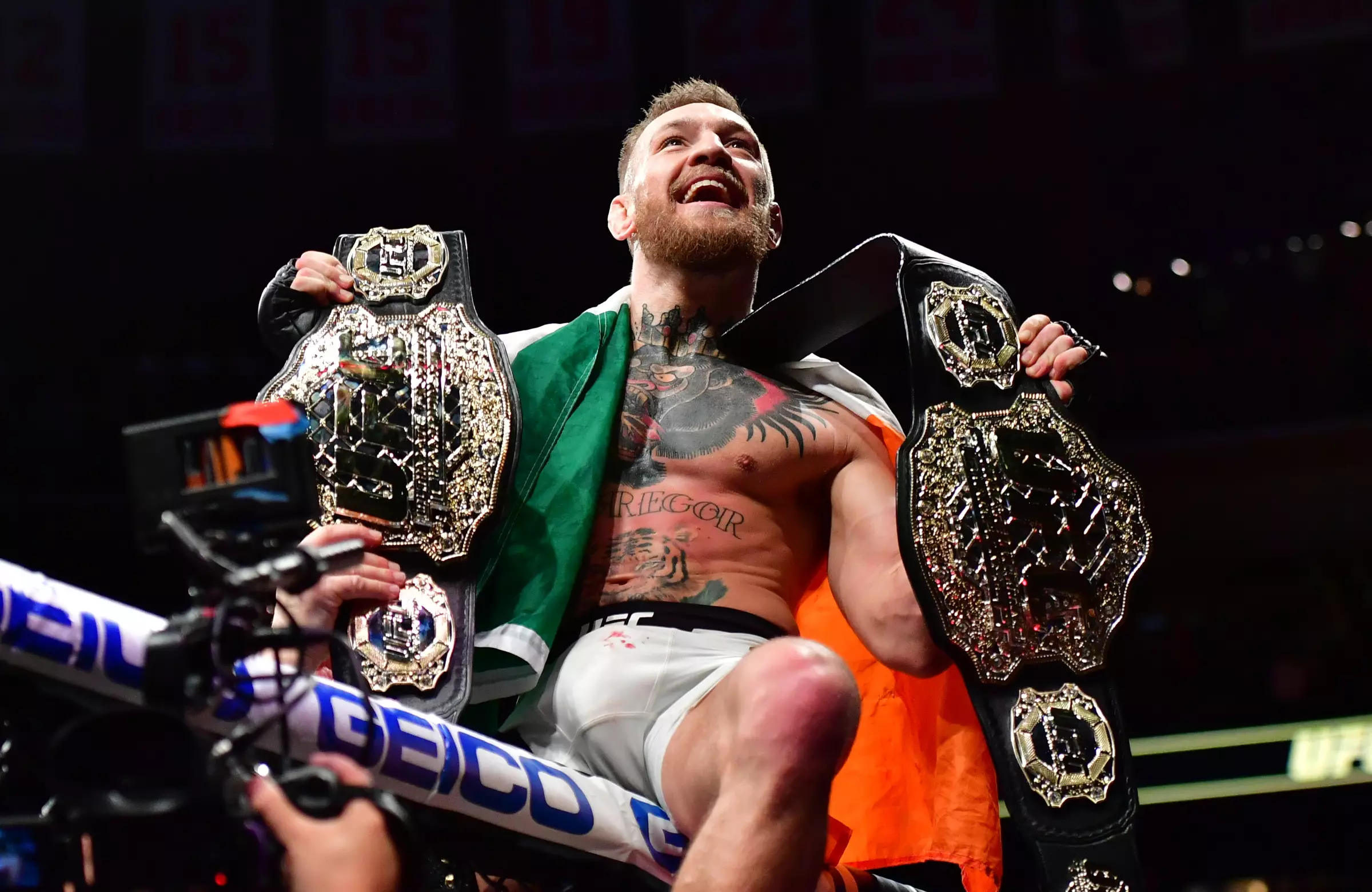 McGregor with the two belts he's had taken away from him but never lost. Image: PA Images