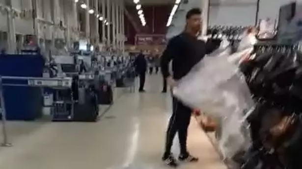 Shopper Filmed Ripping Plastic Sheets Off 'Non-Essential' Items In Welsh Supermarket
