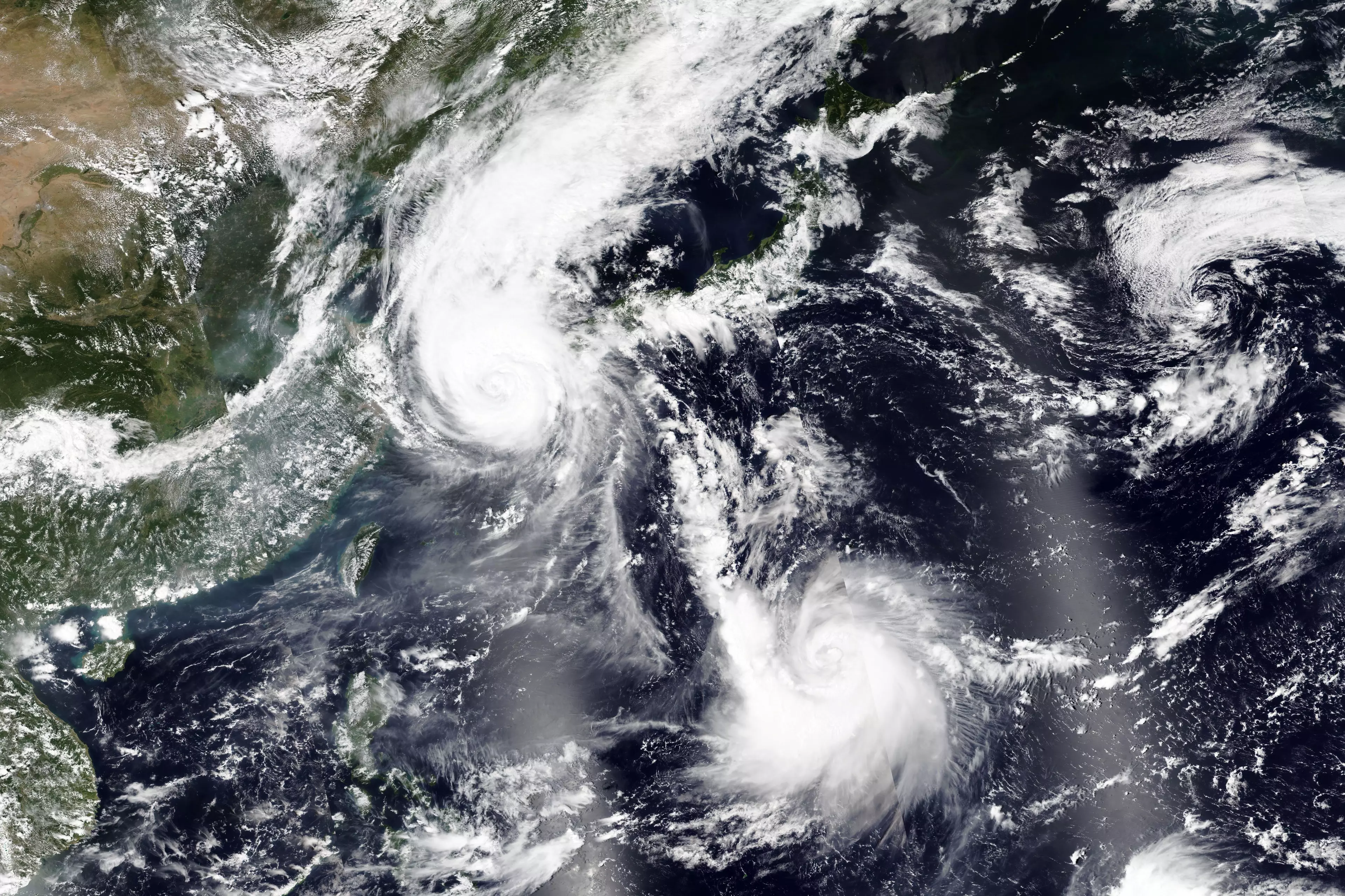 Satellite image released by NASA Worldview, Earth Observing System Data and Information System (EOSDIS) shows Typhoon Maysak over South Korea.