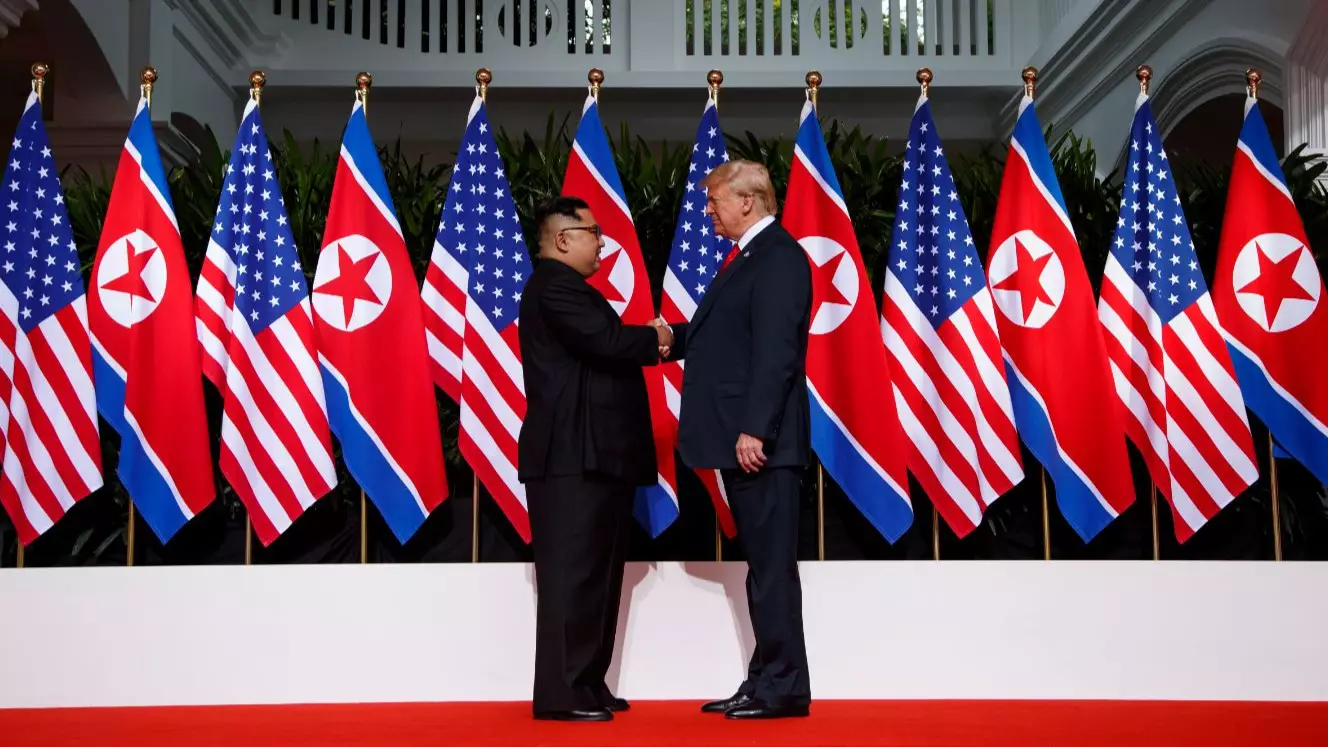 ​Donald Trump And Kim Jong Un Share Historic Handshake