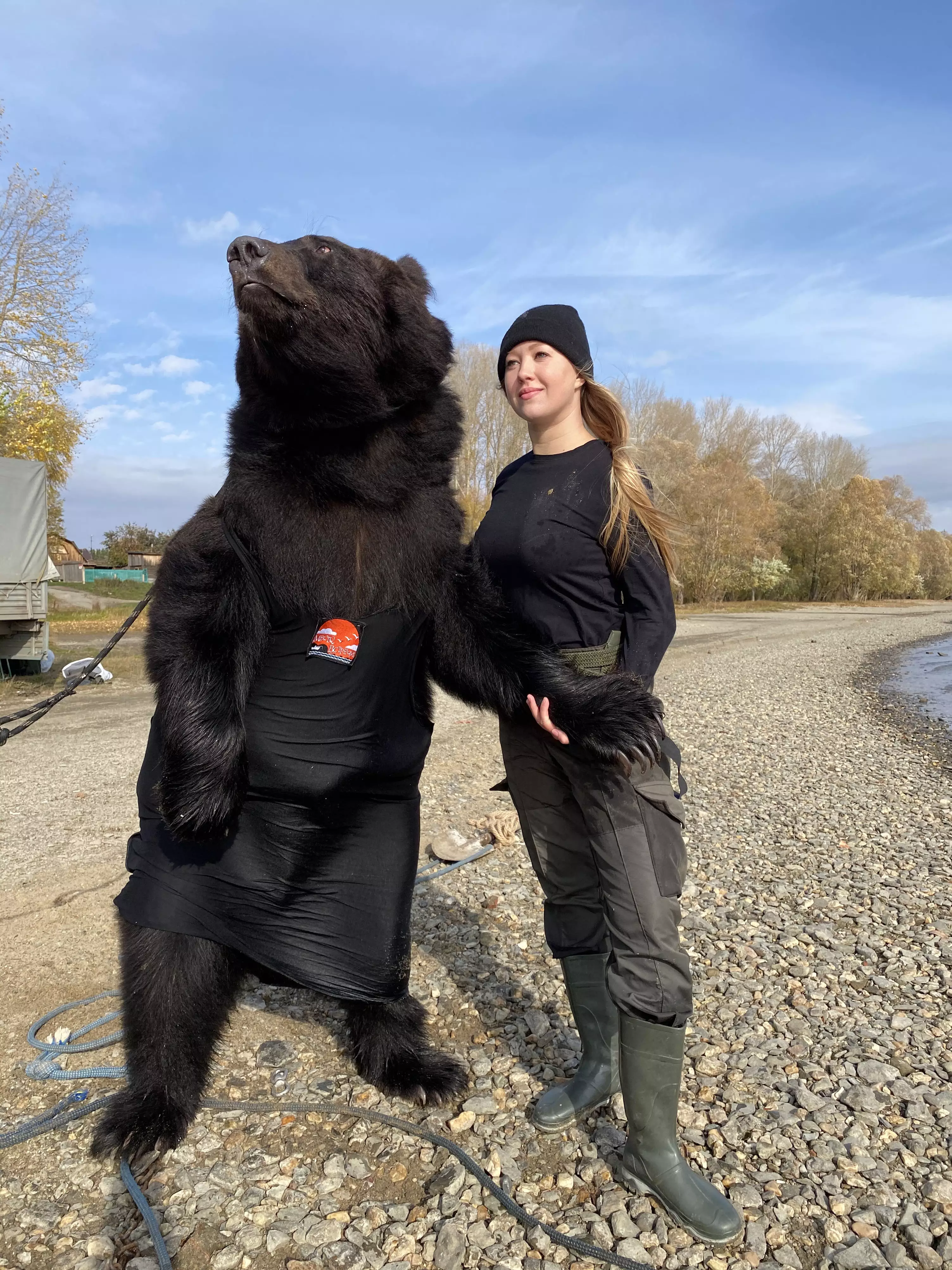 Woman Goes Fishing In Boat With Rescued Brown Bear