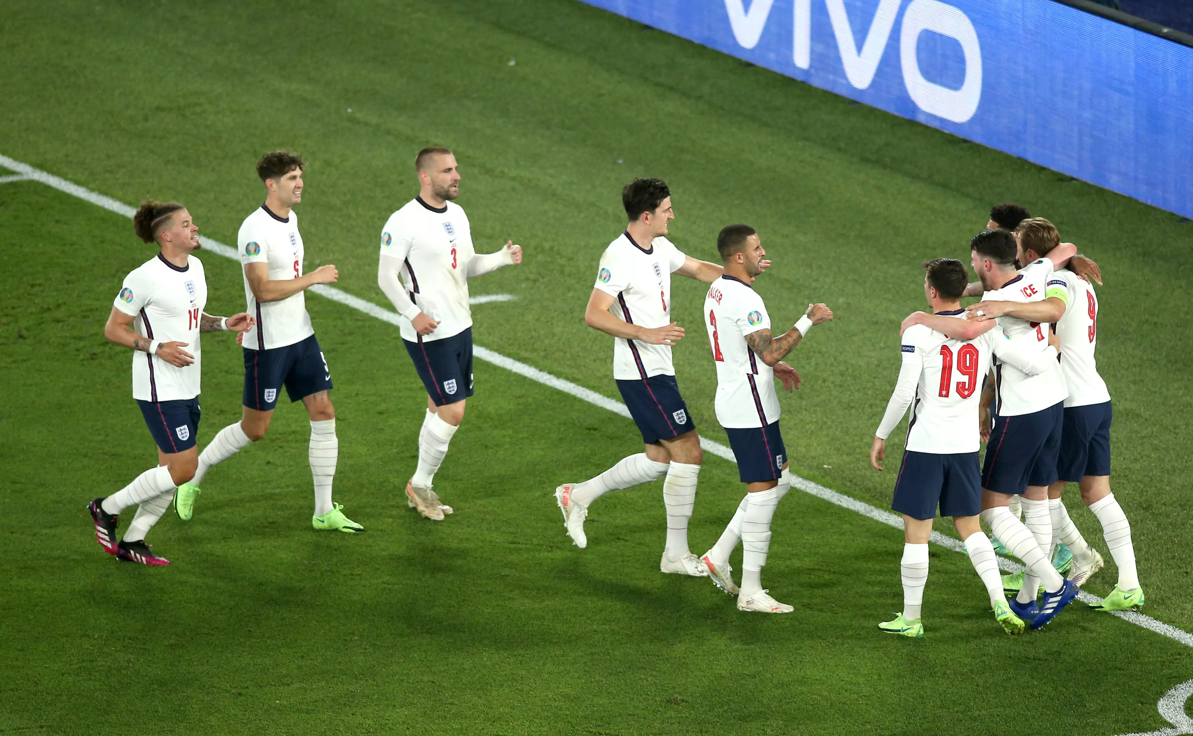 England celebrate after Harry Kane scores their third goal.