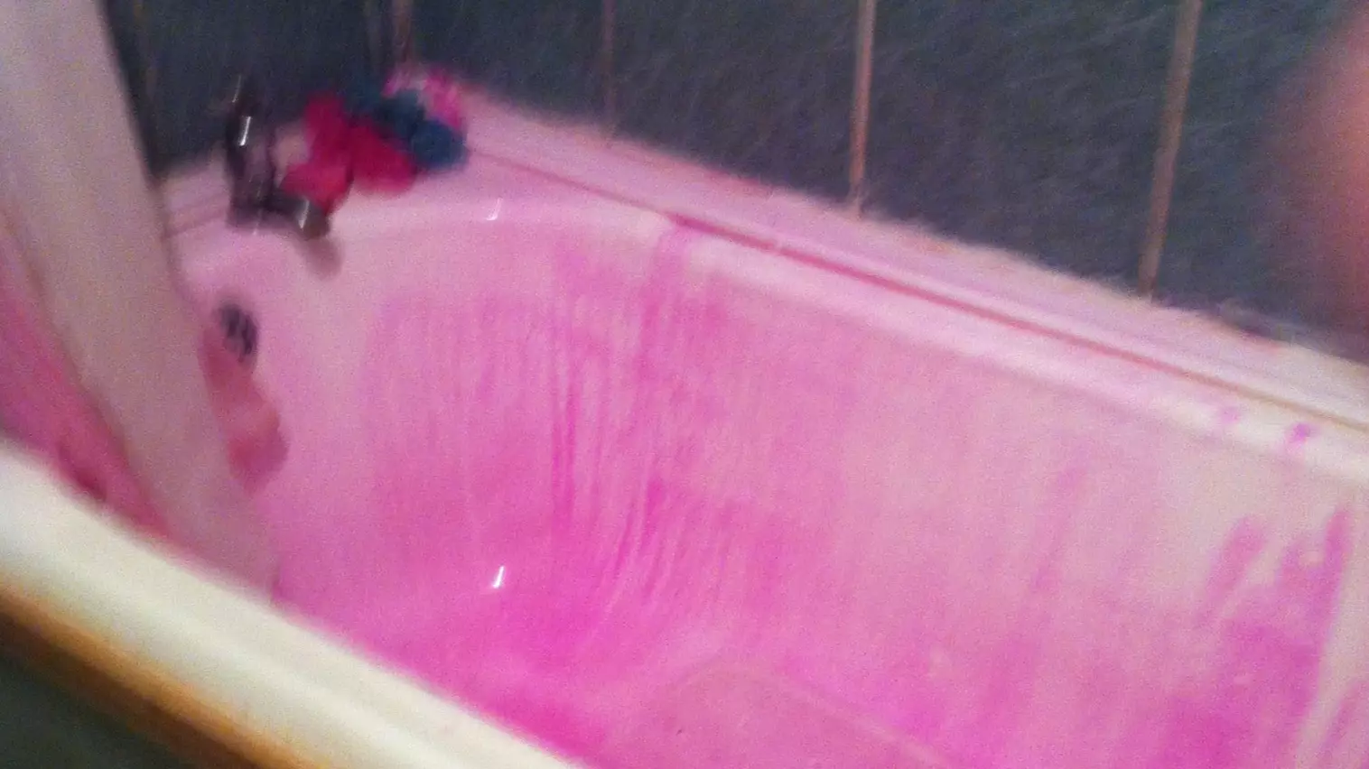 Woman Turns Bright Purple After Washing Hair Dye Out In The Shower