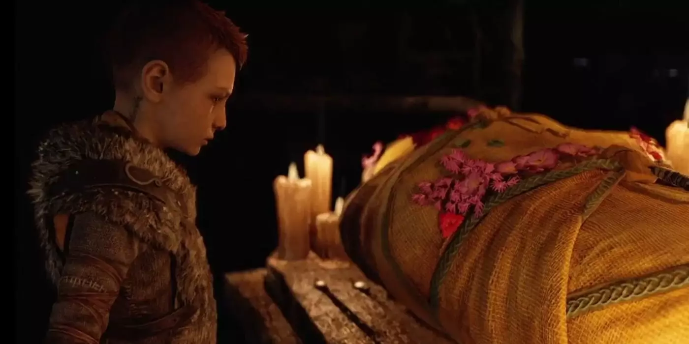 Atreus beside the body of his mother in God of War /