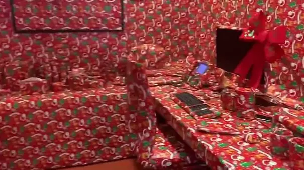 Prankster Employee Covers Her Bosses Office Entirely In Christmas Wrapping Paper