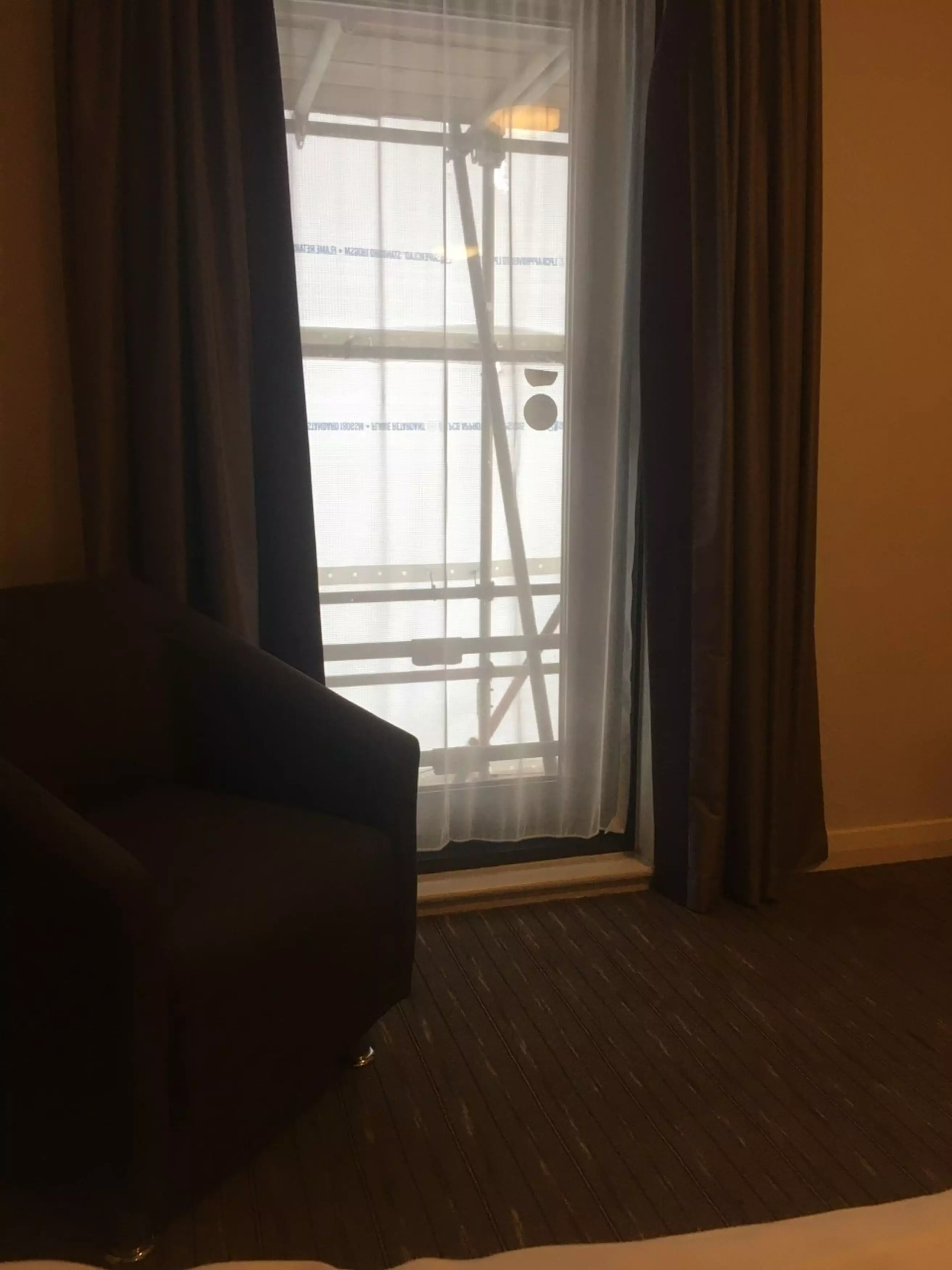 The couple also shared pictures of their obstructed view from the inside of their hotel room (