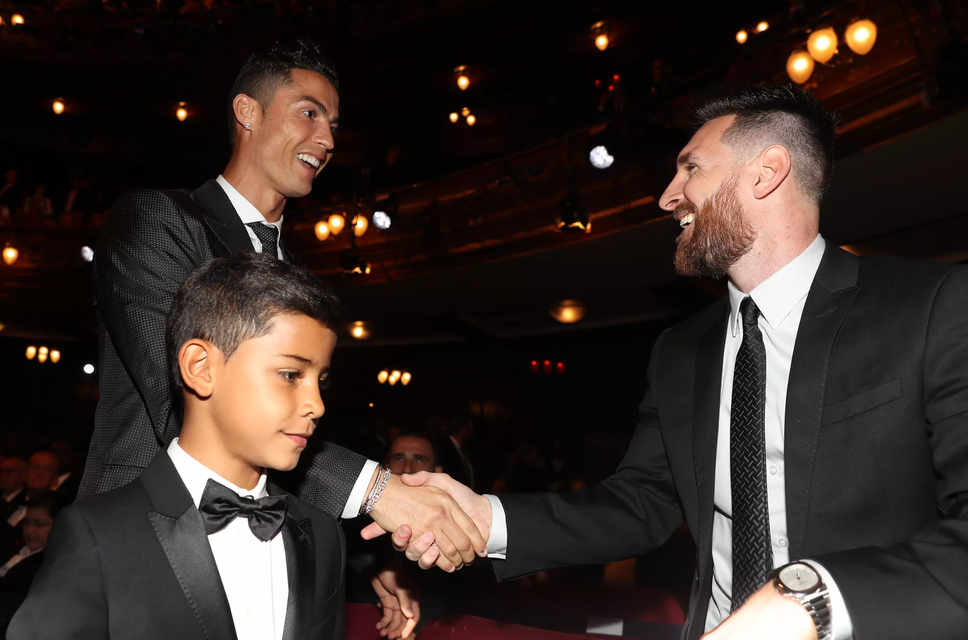 Ronaldo laughing because he doesn't agree with the results, Messi laughing because he does. Image: PA Images