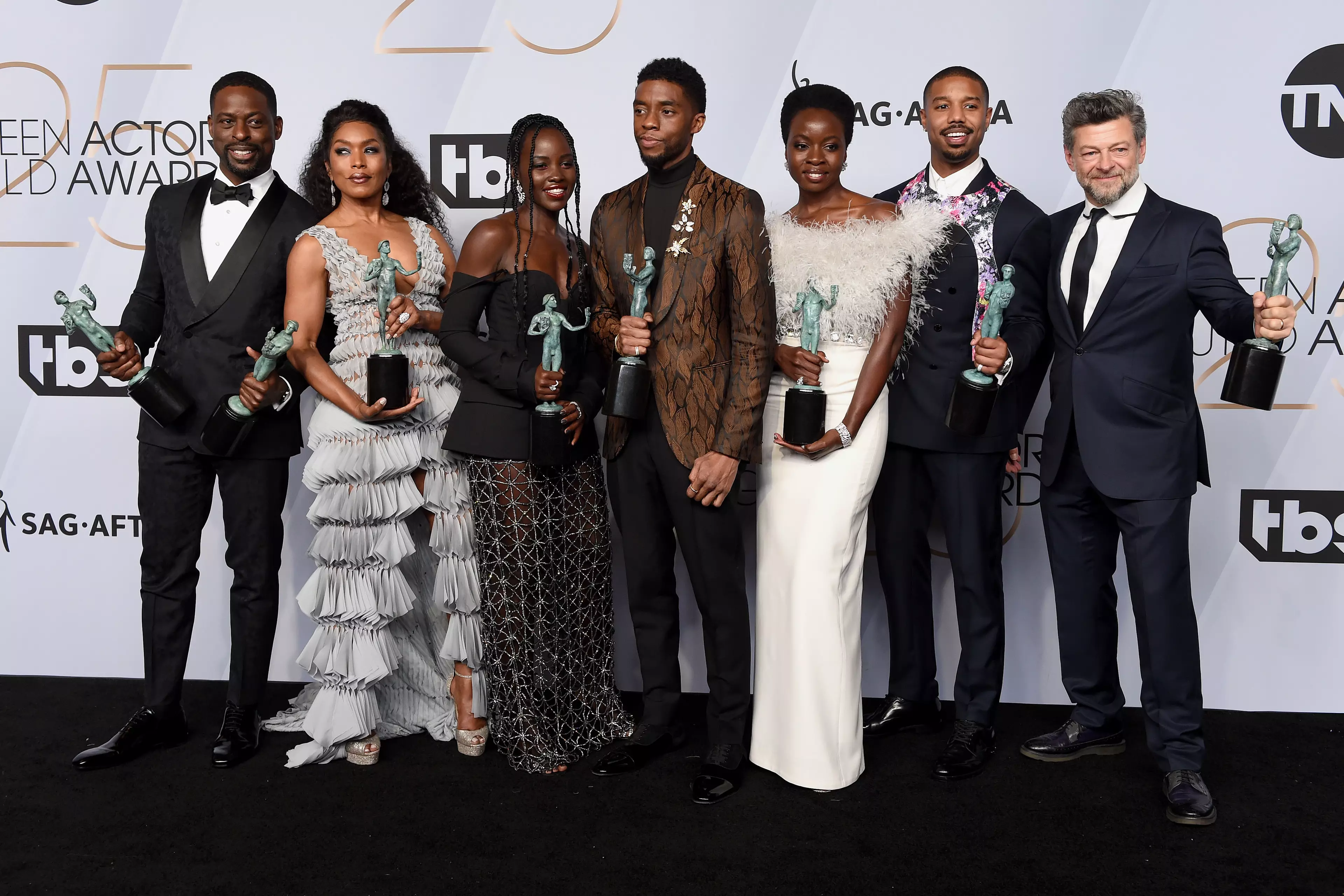 Sterling K. Brown, Angela Bassett, Lupita Nyong'o, Chadwick Boseman, Danai Gurira, Michael B. Jordan, and Andy Serkis from 'Black Panther' at the 2019 SAG Awards.