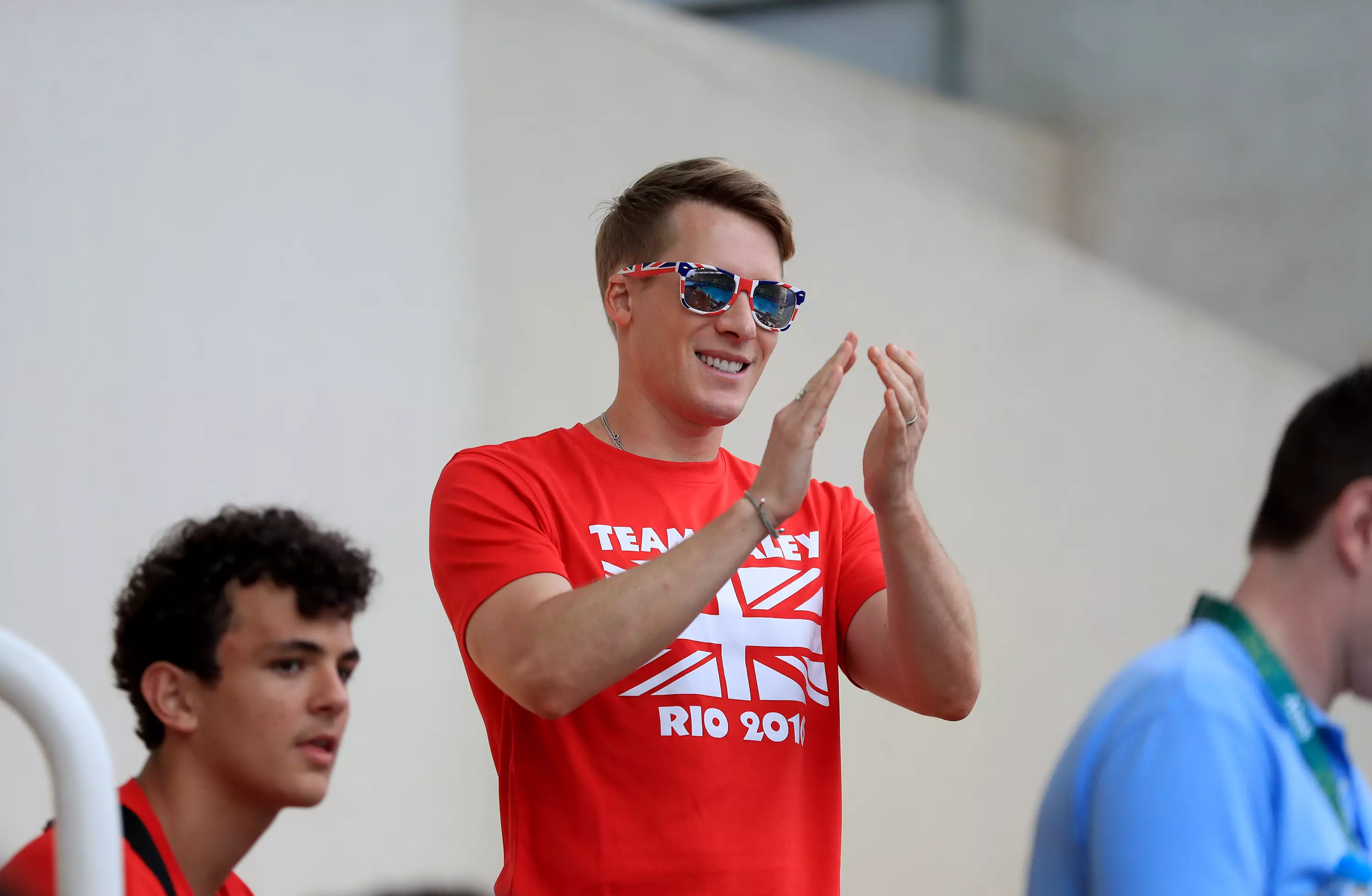 Tom Daley's husband, Dustin Lance Black, cheering Tom on at the Rio 2016 Olympics. (