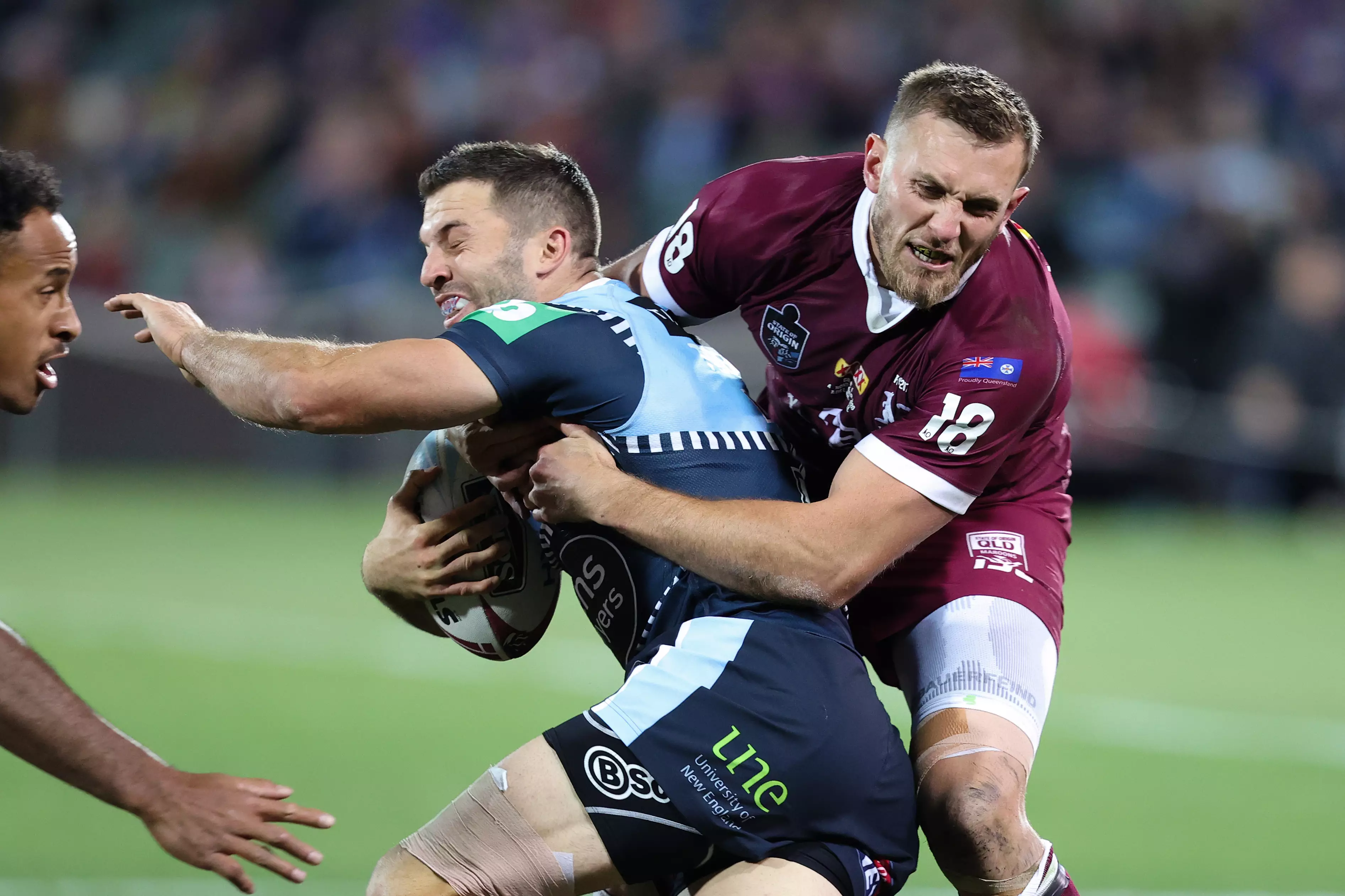 James Tedesco is tackled during the State of Origin series between NSW and Queensland.
