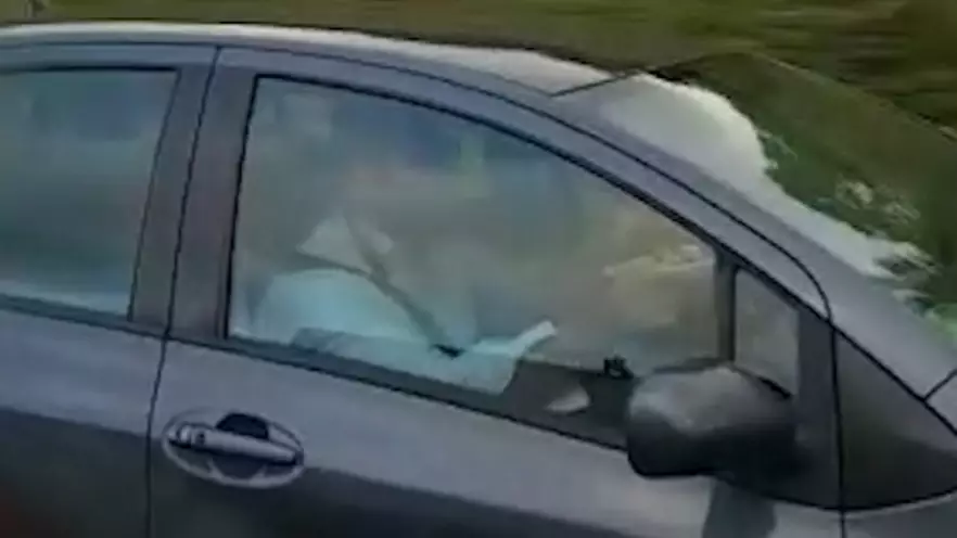 Hungry Driver Eats Plate Of Lasagne While Driving At 60MPH