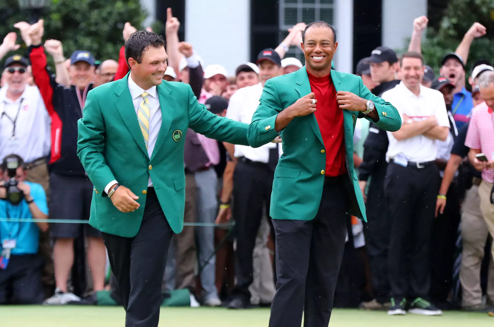 Tiger Woods secured his fifth green jacket... and $1.2 million for a mystery punter.